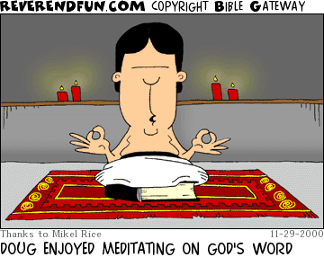 DESCRIPTION: Man sitting lotus style on a Bible with candles burning in the background CAPTION: DOUG ENJOYED MEDITATING ON GOD'S WORD