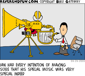 DESCRIPTION: Man standing next to very large and complicated musical instrument CAPTION: IAN HAD EVERY INTENTION OF MAKING SURE THAT HIS SPECIAL MUSIC WAS VERY SPECIAL INDEED