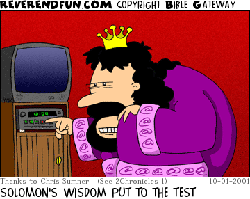 DESCRIPTION: Solomon setting his VCR CAPTION: SOLOMON'S WISDOM PUT TO THE TEST