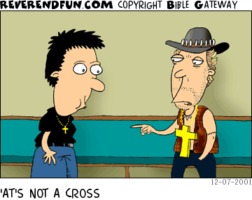 DESCRIPTION: Crocodile Dundee lookin' guy with a huge cross talking to a small guy with a small cross CAPTION: 'AT'S NOT A CROSS