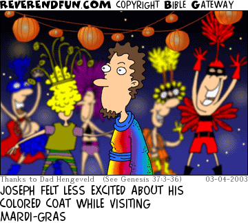 DESCRIPTION: Joseph standing in front of people in radical outfits CAPTION: JOSEPH FELT LESS EXCITED ABOUT HIS COLORED COAT WHILE VISITING MARDI-GRAS