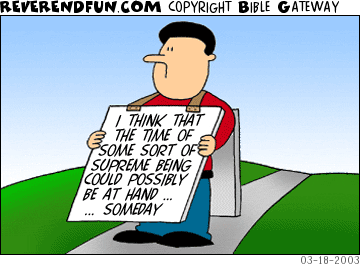 DESCRIPTION: Man with sign that kinda, sorta warns of the return of Jesus CAPTION: 