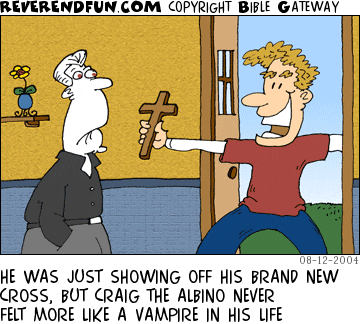 DESCRIPTION: Man showing off cross to an albino CAPTION: HE WAS JUST SHOWING OFF HIS BRAND NEW CROSS, BUT CRAIG THE ALBINO NEVER FELT MORE LIKE A VAMPIRE IN HIS LIFE