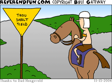 DESCRIPTION: Man on horse at intersection looking at sign CAPTION: 