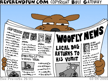 DESCRIPTION: Dog reading paper CAPTION: 