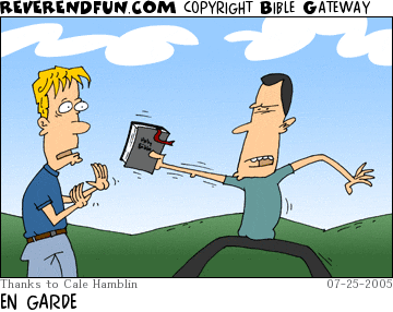 DESCRIPTION: Man confronting another using a Bible CAPTION: EN GARDE