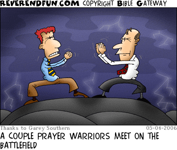 DESCRIPTION: Two men praying in prayer/battle poses CAPTION: A COUPLE PRAYER WARRIORS MEET ON THE BATTLEFIELD