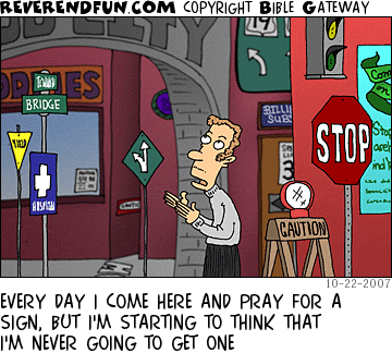 DESCRIPTION: Man looking up and talking to God while standing on a city street that is covered in various signs CAPTION: EVERY DAY I COME HERE AND PRAY FOR A SIGN, BUT I'M STARTING TO THINK THAT I'M NEVER GOING TO GET ONE