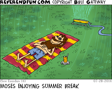 DESCRIPTION: Moses sunbathing near a sprinkler.  Water is going to each side of him CAPTION: MOSES ENJOYING SUMMER BREAK